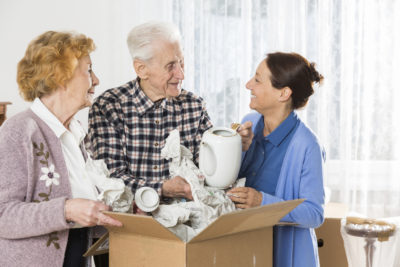 Elderly Couple Packing Moving